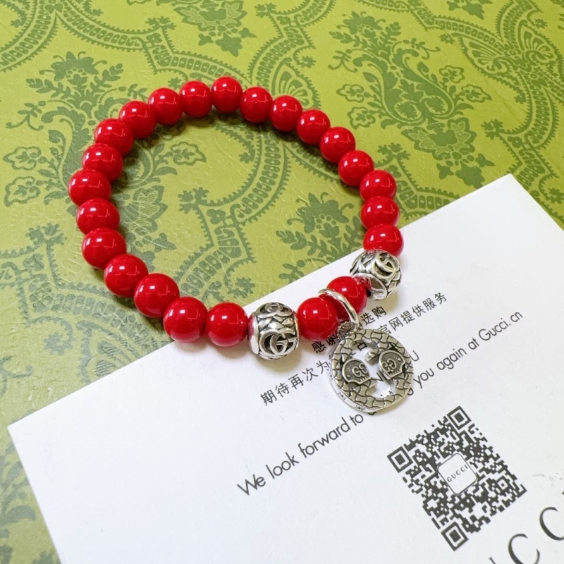 G*u*i bracelets